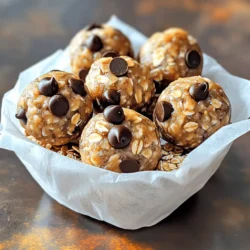 - 1 cup rolled oats - 1/2 cup creamy peanut butter - 1/3 cup honey or maple syrup - 1/2 cup chocolate chips (dark or semi-sweet) - 1/4 cup ground flaxseed (optional) - 1/2 teaspoon vanilla extract - A pinch of salt You will need a few simple ingredients to make Peanut Butter Chocolate Chip Energy Balls. These ingredients come together to create a tasty and healthy snack. Rolled oats give the energy balls a great base. They add fiber and help keep you full. Creamy peanut butter makes the balls rich and smooth. It also adds protein and healthy fats. You can choose honey or maple syrup for sweetness. Both options work well, depending on your taste. Chocolate chips add a nice touch of sweetness and flavor. You can use dark or semi-sweet ones, based on your preference. If you want extra nutrition, add ground flaxseed. It is optional but highly recommended. It adds omega-3s and fiber. Vanilla extract gives the mixture a lovely aroma. Finally, a pinch of salt balances the sweetness and enhances the flavors. Together, these ingredients create a simple yet delicious snack. For the full recipe, check out the instructions provided earlier. To make Peanut Butter Chocolate Chip Energy Balls, start by gathering all your ingredients. This simple snack takes about 10 minutes to prep and 30 minutes to chill. You will mix dry and wet ingredients, form the balls, and let them set. In a large bowl, combine the rolled oats, ground flaxseed, and a pinch of salt. Stir them well so everything mixes evenly. This step is crucial for the taste and texture. Flaxseed adds nutrition, but it’s optional. If you don’t have it, that’s okay! In a separate bowl, add creamy peanut butter, honey or maple syrup, and vanilla extract. Stir until this mixture is smooth. Then, pour it into the bowl with dry ingredients. Mix thoroughly, ensuring all the dry ingredients get coated. This is where the magic happens! Now, it’s time to form the energy balls. Take small amounts of the mixture and roll them into balls about one inch in diameter. If your hands get sticky, wet them slightly. You can also chill the mixture for 10 minutes to make rolling easier. Once you've formed the balls, place them on a parchment-lined baking sheet or plate. Refrigerate them for at least 30 minutes. This step helps them firm up. After they’re set, you can store them in an airtight container in the fridge. They last about a week and are perfect for a quick snack or energy boost. For the full recipe, check the earlier section. To change the texture of your energy balls, you can add more oats. If you want them softer, use less oats. If they are too sticky, chill the mixture for a bit. Wet your hands when rolling the balls to avoid sticking. You can also add a bit more peanut butter for a creamier texture. You can boost the flavor of your energy balls in many ways. Try adding a pinch of cinnamon or nutmeg for warmth. A splash of almond extract can also add a nice touch. Experiment with different types of chocolate chips, like dark or white chocolate, to find your favorite. For a fun look, place the energy balls in a cute basket lined with parchment paper. You can sprinkle a few chocolate chips on top or use small cupcake liners. This makes them easy to grab and adds a nice touch for guests. These energy balls pair well with fresh fruit like bananas or apples. You can also serve them alongside a glass of milk or a smoothie. This makes a great snack after school or a quick breakfast on the go. For more ideas, check the Full Recipe for other tasty tips! {{image_2}} You can easily switch some ingredients in this recipe for Peanut Butter Chocolate Chip Energy Balls. Personalizing them makes them more fun! - Nut Substitutions: If you have nut allergies or just want a change, use sunflower seed butter or almond butter. These options still keep the taste tasty and smooth. They also add a unique flavor twist! - Sweetener Choices: Instead of honey or maple syrup, try agave syrup or brown rice syrup. Each sweetener gives a different touch. It can change the flavor and sweetness level. Want to make your energy balls more exciting? Adding flavors can be a great way to do it. - Dried Fruits: Chopped dried fruits like cranberries or apricots add sweetness and a chewy texture. They pair nicely with chocolate, too! You may want to adjust the sweetener if you add dried fruit. - Seeds: Adding chia seeds or pumpkin seeds boosts nutrition. They also give a nice crunch. Just mix them in with the oats before forming the balls. For the full recipe, check out the earlier section. These variations can help you find your favorite way to enjoy these energy balls! To keep your Peanut Butter Chocolate Chip Energy Balls fresh, store them in an airtight container. This helps maintain their texture and flavor. I prefer using glass containers, as they do not retain odors. You can place parchment paper between layers to prevent sticking. Always keep them in the refrigerator to stay safe and delicious. These energy balls last about one week in the fridge. After that, they may lose their flavor and freshness. If you notice any changes in smell or texture, it’s best to toss them. For the best taste, enjoy them within the first few days. You can freeze the energy balls for longer storage. First, place them in a single layer on a baking sheet. Freeze for about an hour. Once firm, transfer them to a freezer-safe bag or container. They can last up to three months in the freezer. When you’re ready to eat, just pull out a few and let them thaw in the fridge. This way, you can enjoy your tasty snacks anytime! For the full recipe, check above. Peanut butter chocolate chip energy balls last about one week when stored in the fridge. Keep them in an airtight container. This helps keep them fresh and tasty. If you want to keep them longer, you can freeze them. They can last up to three months in the freezer. Just remember to thaw them in the fridge before you enjoy them! Yes, you can use natural peanut butter. It adds a great flavor to the energy balls. Just make sure your natural peanut butter is smooth. Stir it well before using, as the oil may separate. If it’s too thick, it might make mixing harder, so consider adding a bit more honey or syrup to balance it out. If you need a substitute for honey or maple syrup, try agave syrup or brown rice syrup. Both options work well and provide sweetness. You can also use date syrup for a richer flavor. If you want something lower in sugar, you can use mashed bananas or unsweetened applesauce. These will change the texture a bit, but they still taste great! Yes, these energy balls can be gluten-free! Just make sure you use certified gluten-free oats. Regular oats may be processed in a facility that handles gluten, so always check the label. With the right oats, anyone can enjoy these tasty snacks! This blog post covered how to make tasty Peanut Butter Chocolate Chip Energy Balls. We discussed ingredients, from oats to chocolate chips, and shared nutritional info and dietary tips. I explained how to prepare and mix the ingredients, offered tips for flavor and texture, and suggested variations and storage methods. In conclusion, these energy balls are fun and easy to make. They also fit many diets. Enjoy making them your own with different flavors. They are great for snacks or quick energy boosts. Try them today and see how simple healthy eating can be!