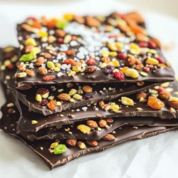 - Dark chocolate (70% cocoa or higher) - Mixed nuts (almonds, pistachios, walnuts) - Dried fruit (cranberries, apricots, cherries) - Flaky sea salt - Coconut oil (optional) To make Dark Chocolate Sea Salt Bark, you need a few key ingredients. First, choose dark chocolate with at least 70% cocoa. This gives the bark a rich taste. Next, grab some mixed nuts like almonds, pistachios, and walnuts. They add crunch and flavor. For sweetness, dried fruits like cranberries, apricots, or cherries work well. They bring a nice contrast to the chocolate. Flaky sea salt is essential. It enhances the chocolate's deep flavor. You can adjust how much you use based on your taste. Lastly, coconut oil is optional. It helps make the chocolate shiny when melted. Gather these ingredients, and you’re ready for a fun cooking adventure! - Line the baking sheet with parchment paper: Start by covering the baking sheet with parchment paper. This step helps the bark come off easily later. Make sure the paper hangs over the edges a bit. - Melt the dark chocolate and coconut oil: In a microwave-safe bowl, mix the chopped dark chocolate and coconut oil. Heat them in 30-second bursts. Stir in between until everything is smooth. - Cool the melted chocolate: Once melted, take the bowl off the heat. Let it cool for about 5 minutes. This cooling helps the chocolate set better later. - Pour and spread the chocolate on the baking sheet: Pour the melted chocolate onto your prepared baking sheet. Use a spatula to spread it evenly to about 1/4 inch thick. - Add nuts and dried fruit: Sprinkle the chopped mixed nuts and dried fruit evenly over the chocolate. Gently press them down with the back of a spoon. This helps them stick. - Sprinkle with sea salt: Finally, add flaky sea salt on top. Use a good amount for a tasty contrast. Adjust to your liking. - Refrigerate until hardened: Place the baking sheet in the fridge. Let it chill for 1-2 hours or until the chocolate is hard. - Break into pieces: Once set, lift the bark off using the parchment paper. Break it into pieces of your choice. Enjoy your treat! To make your Dark Chocolate Sea Salt Bark great, focus on thickness. A layer about 1/4 inch gives the best crunch. Too thin, and it may break easily. Too thick, and it might not set well. Next, pick the right nuts and fruits. I love mixing almonds, pistachios, and walnuts for crunch. Dried cranberries, apricots, or cherries add sweetness. Feel free to experiment with what you like! One common mistake is overheating the chocolate. Heat it slowly in short bursts. This keeps it smooth and creamy. Stir it often to help it melt evenly. Another pitfall is not cooling the chocolate long enough. Let it sit for about 5 minutes after melting. This step keeps your bark from being too gooey when you add toppings. For serving, use a pretty plate. You can also box the bark in cellophane for gifts. This makes it look special. A sprinkle of extra sea salt on top adds a nice touch. Try to break the bark into fun shapes. This adds interest and makes it fun to eat. Each piece can be a little different, which is part of the charm! {{image_2}} You can change the chocolate type for your bark. Try milk or white chocolate for a sweeter twist. Each chocolate brings a unique taste. Experiment with flavors to find your favorite. Nuts and fruits can also switch up your bark. Instead of mixed nuts, use pecans or hazelnuts. You can swap dried fruit for mango or figs. Each choice adds its own special touch. Want to spice things up? Add a pinch of cinnamon for warmth. If you like heat, try a few chili flakes. These spices can change your bark from simple to exciting. You can also explore different sea salts. Try smoked salt for a deeper flavor. Or use flavored salts like garlic or rosemary for a unique twist. Make your bark festive with fun additions. During holidays, add festive sprinkles or dried citrus peel. These will make your bark look cheerful and bright. For summer, mix in fresh fruit. Diced strawberries or blueberries pair well with chocolate. These fresh flavors can bring a burst of joy in every bite. To keep your dark chocolate sea salt bark fresh, use airtight containers. This will protect it from moisture and strong odors. Store the bark at room temperature in a cool, dry place. Avoid direct sunlight, which can melt the chocolate. The dark chocolate sea salt bark stays fresh for about two weeks. After that, it may lose its flavor and texture. Signs that the bark has gone bad include a dull appearance or a strange smell. If it becomes soft or sticky, it's time to toss it. Yes, you can freeze chocolate bark! To do this, wrap it tightly in plastic wrap and then place it in a freezer bag. This keeps it safe from freezer burn. When you want to enjoy it again, take it out and let it thaw in the fridge for a few hours. Avoid microwaving it, as this can alter the texture. The best chocolate for bark is dark chocolate with at least 70% cocoa. This type has rich flavor and smooth texture. You can also use milk or white chocolate, but they will taste sweeter. Dark chocolate gives a nice balance with the sea salt. Yes, you can use many types of nuts and fruits. Almonds, pistachios, and walnuts work great. You can also try cashews or hazelnuts for a different taste. For fruits, cranberries, apricots, and cherries are lovely. You can even use raisins or coconut flakes. To make your bark glossy, add a bit of coconut oil when melting the chocolate. Just one tablespoon is enough. Stir it in with the chocolate until it melts. This will give your bark a shiny finish that looks great. Dark chocolate bark can be a healthy treat if enjoyed in moderation. Dark chocolate has antioxidants and may improve heart health. The nuts provide healthy fats, and dried fruit adds fiber. Just watch the portion size, as it can be high in calories. Yes, you can make this bark vegan. Use dark chocolate that is dairy-free. Many brands offer vegan options with high cocoa content. Also, check that your nuts and dried fruits do not have added animal products. This way, you can enjoy a tasty vegan treat! This chocolate sea salt bark is simple and fun to make. You need dark chocolate, mixed nuts, dried fruit, and a bit of sea salt. Follow our step-by-step instructions for easy preparation and assembly. Remember to avoid common mistakes, like overheating chocolate. Try different variations to keep things interesting. Store your bark in airtight containers to maintain its freshness. This treat is not just delicious; it can also make a great gift. Enjoy making it your way!