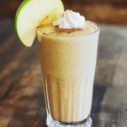 - 1 medium apple, cored and chopped - 1 banana, frozen - 1 cup unsweetened almond milk - 1/2 teaspoon ground cinnamon - 1/4 teaspoon nutmeg - 1 tablespoon maple syrup - 1/4 cup rolled oats - 1 tablespoon almond butter (optional) - Ice cubes (optional) Best apple varieties for smoothies: Choose sweet apples like Fuji or Honeycrisp. They blend well and taste great! Alternatives to almond milk: You can use oat milk or soy milk if you prefer. Coconut milk adds a fun twist too. Sweetener substitutions: If you like, swap maple syrup for honey or agave nectar. Adjust to your taste! - Step 1: Blending the base ingredients Start by adding the chopped apple, frozen banana, and almond milk to your blender. This mix gives you a great base. The sweet apple and banana create a smooth blend. - Step 2: Adding spices and oats Next, sprinkle in the ground cinnamon, nutmeg, and maple syrup. Then, add the rolled oats and almond butter if you like it creamy. Each spice adds flavor and warmth, making it cozy like a pie. - Step 3: Final touches and adjustments Blend everything on high until it is smooth. If it seems too thick, pour in a splash more almond milk. For a colder treat, toss in some ice cubes and blend again. Taste it and add more maple syrup if you want it sweeter. - Recommended blender settings Use a high-speed setting for the best results. This helps all the ingredients mix well. Start slow and then increase the speed. - How to achieve the perfect texture Aim for a creamy and thick texture. If it feels too thick, add more milk slowly. Check the texture after blending. You want it smooth but not runny. To make your smoothie shine, fresh fruits work best. Fresh apples bring bright, crisp notes. Use sweet apples like Fuji or Honeycrisp for more flavor. Frozen bananas add creaminess and chill. They blend smoothly and make drinks thick. If you have a ripe banana, freeze it overnight. It will transform your smoothie! For extra taste, try adding spices. Nutmeg adds warmth and depth. Vanilla extract gives a sweet, fragrant note. You can also try ginger for a zingy kick. Start with a small pinch, then taste. Adjust spices to match your liking. A beautiful smoothie needs a lovely presentation. Pour your drink into tall, clear glasses. This shows off the creamy, smooth texture. For a special touch, add a slice of apple on the glass rim. Sprinkle some cinnamon on top for a charming look. Pair this smoothie with snacks like granola bars or oatmeal cookies. It also goes well with breakfast. Serve it with pancakes or waffles for a delightful start. Enjoy this delicious smoothie any time of day! {{image_2}} You can change this smoothie to fit your tastes. One fun way is to add pumpkin. This gives a nice fall flavor. Just mix in a half-cup of pumpkin puree. It adds creaminess and a rich taste. You can also add pumpkin spice. This gives a warm and cozy feel. Another great swap is between nut butters. You can use peanut butter or almond butter. Both add protein and flavor. Peanut butter has a strong taste. Almond butter is milder. Try both and see which one you like better! If you want a vegan or dairy-free option, this smoothie is easy to adjust. Just use almond milk or any plant-based milk. You can skip the maple syrup if you want less sugar. Instead, use a ripe banana for natural sweetness. For those who need gluten-free meals, this smoothie works well too. Just make sure your oats are labeled gluten-free. They can sometimes contain gluten. This way, you can enjoy the smoothie without worry! To keep your Cinnamon Apple Pie Smoothie fresh, put it in a sealed jar. The best practice is to refrigerate it right after blending. This keeps the flavors bright and tasty. Smoothies can last in the fridge for up to 24 hours. If you want to store it longer, you can freeze it. Pour the smoothie into ice cube trays or freezer bags. It can stay fresh in the freezer for up to three months. Just remember to thaw it in the fridge before you drink it again. To tell if your smoothie is still good, check for changes. If it smells sour or has a strange color, it’s time to toss it. Also, if it separates a lot, it might not taste great. A good smoothie should look creamy and smell fresh. Always trust your senses. If anything feels off, don’t risk it—enjoy it fresh instead! Can I make this smoothie ahead of time? Yes, you can make this smoothie ahead of time. Just blend it as usual. Pour it into a jar or container. Seal it tightly and store it in the fridge. It tastes best within one day. Stir or shake it before you drink. This keeps the flavors fresh. How can I make it more filling? To make the smoothie more filling, add more oats or a scoop of protein powder. You can also include Greek yogurt or more almond butter. These options boost the protein and fiber. They help keep you full longer. What are the health benefits of the ingredients? The ingredients in this smoothie offer many health benefits. Apples provide fiber and vitamin C. Bananas are great for potassium and energy. Almond milk is low in calories and dairy-free. Oats add more fiber and help with digestion. Cinnamon has anti-inflammatory properties. Nutmeg can aid in digestion too. Enjoying this smoothie gives you a tasty way to get nutrients! This blog post covered how to make a delicious smoothie. We discussed simple ingredients like apples and bananas. I shared tips on blending, enhancing flavor, and serving suggestions. You can even explore variations with pumpkin or different nut butters. Keep these tips in mind as you create your perfect smoothie. Experiment and have fun. Smoothies can be tasty and good for you! Enjoy your smoothies fresh or stored, knowing you’ve made something great.