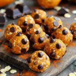 To make pumpkin chocolate chip energy balls, you will need: - 1 cup rolled oats - 1/2 cup pumpkin puree - 1/3 cup natural peanut butter (or almond butter) - 1/4 cup honey or maple syrup - 1/2 cup chocolate chips (dark or milk) - 1 teaspoon vanilla extract - 1 teaspoon pumpkin spice (or a mix of cinnamon, nutmeg, and ginger) - A pinch of salt These simple ingredients create a tasty and nutritious snack that packs a punch. You can swap ingredients based on your taste or what you have. Here are some ideas: - Nut Butter: Use almond butter if you prefer. Sunflower seed butter works too for nut-free options. - Sweetener: If you want a lower sugar option, use mashed bananas or dates instead of honey. - Chocolate Chips: Try using white chocolate chips or even dried fruit for a different twist. - Spices: If you don't have pumpkin spice, mix cinnamon, nutmeg, and ginger for a similar flavor. This recipe can fit many dietary needs. Here’s how: - Gluten-Free: Use certified gluten-free oats to keep these energy balls gluten-free. - Vegan: Replace honey with maple syrup or agave syrup for a vegan-friendly treat. - Nut-Free: Use sunflower seed butter instead of peanut or almond butter to make it nut-free. These easy swaps ensure everyone can enjoy these energy balls! To make pumpkin chocolate chip energy balls, gather your ingredients first. This no-bake treat is quick and easy. You need rolled oats, pumpkin puree, natural peanut butter, honey, chocolate chips, vanilla extract, pumpkin spice, and a pinch of salt. 1. In a large mixing bowl, combine 1 cup of rolled oats, 1/2 cup of pumpkin puree, and 1/3 cup of peanut butter. Mix these well until they blend. 2. Next, add 1/4 cup of honey or maple syrup, 1 teaspoon of vanilla extract, and 1 teaspoon of pumpkin spice. Don’t forget the pinch of salt! Stir everything together until it’s smooth and well combined. 3. Now, gently fold in 1/2 cup of chocolate chips. Make sure they are evenly spread throughout the mixture. 1. Take small portions of the mixture with your hands. Roll them into balls about the size of a tablespoon. 2. Place the energy balls on a baking sheet or a plate lined with parchment paper. 3. Put the energy balls in the fridge for at least 30 minutes. This helps them firm up. 4. Once they are set, enjoy your tasty energy balls as a snack or a quick breakfast! To get the perfect texture for your energy balls, you need the right mix. Use rolled oats for a chewy base. The pumpkin puree adds moisture and creaminess. Make sure to use natural peanut butter, as it binds well. If the mixture feels too dry, add a splash of water or more pumpkin. If it’s too wet, add more oats. The key is to find balance. To keep your energy balls fresh, store them in an airtight container. Place a sheet of parchment paper between layers if you stack them. This prevents sticking and keeps them safe. You can also pop them in the fridge for up to a week. For longer storage, freeze them. Just make sure they are well-wrapped. When you are ready to eat, let them thaw for a few minutes. These energy balls are great for any time of day. Serve them as a quick breakfast. They also make a perfect snack for kids after school. Want a boost? Pair them with a cup of yogurt or a smoothie. You can even use them as a topping on oatmeal. The options are endless, and they taste amazing! {{image_2}} You can change up the flavor of your energy balls easily. Swap the peanut butter for almond butter, sun butter, or cashew butter. Each nut butter offers a unique taste and texture. If you want a spicier kick, add more pumpkin spice or try cinnamon and ginger. You can even experiment with chocolate protein powder for an extra boost. Add-ins can make your energy balls even better. Chopped nuts like walnuts or pecans add crunch and flavor. Seeds, like chia or flaxseeds, boost nutrition. If you like a touch of sweetness, add dried fruits like cranberries or raisins. These can enhance the texture and taste, making each bite a surprise. These energy balls are great for any season. In fall, enjoy them with apple pie spice for a cozy flavor. In winter, add peppermint extract for a festive twist. You can even roll the balls in cocoa powder for a chocolatey touch. Each season brings new flavors you can explore. To keep your Pumpkin Chocolate Chip Energy Balls fresh, store them in an airtight container. This helps prevent moisture and keeps them tasty. You can place them in the fridge or at room temperature. If you put them in the fridge, they stay firm and cool. If you store them at room temperature, they may get softer. If you want to keep these energy balls longer, freezing is a great option. First, place them on a baking sheet in a single layer. Freeze them for about an hour. Once they are firm, transfer the balls to a freezer-safe bag or container. Make sure to remove any extra air before sealing. They can last for up to three months in the freezer. When ready to eat, just thaw them in the fridge overnight. These energy balls can last up to a week in the fridge. Keep an eye on them for any signs of spoilage. If you notice changes in smell or texture, it's best to toss them. Always check for freshness before you enjoy your snack. The great thing about these energy balls is that they are easy to make again, so you can always whip up a new batch! Yes, you can make these energy balls vegan. Just replace honey with maple syrup. Use almond butter instead of peanut butter. This keeps the recipe plant-based and tasty. These energy balls last about one week in the fridge. Just store them in an airtight container. This helps keep them fresh and tasty for snacking. Yes, you can substitute pumpkin puree. Use unsweetened applesauce or mashed banana instead. Both options add moisture and flavor, making your energy balls still delicious. You now have a clear guide to making great energy balls. We covered ingredients, substitutions, and dietary needs. You learned step-by-step instructions for mixing and chilling. Tips for texture and storage will help your energy balls stay fresh. Variations add fun flavors and creative add-ins. By following these steps, you can create energy balls that fit your taste and needs. Enjoy making them for yourself and your loved ones!
