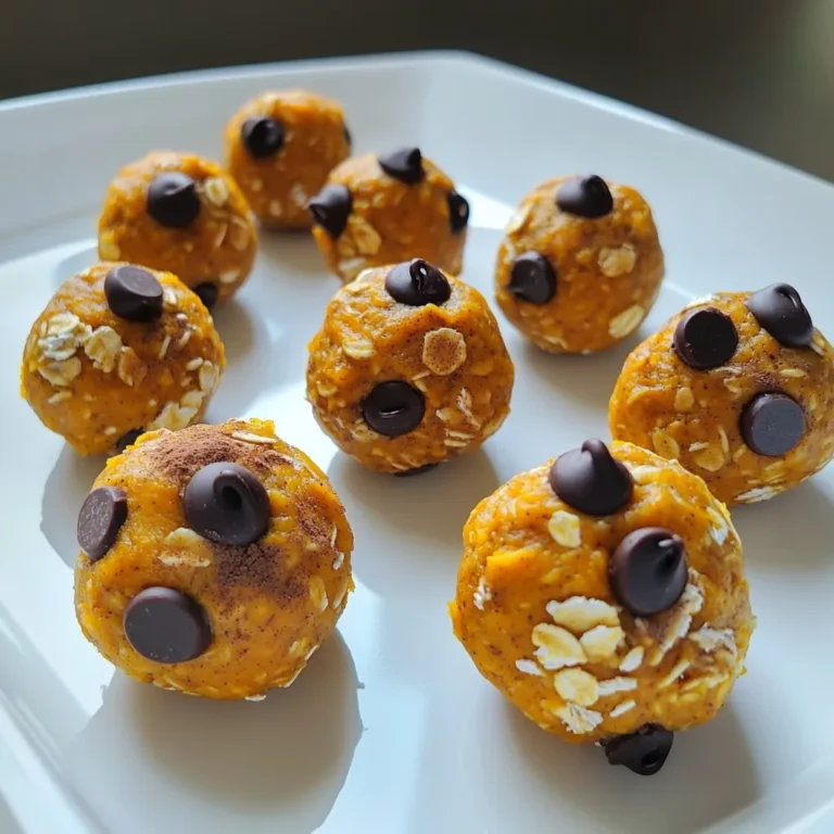 To make pumpkin protein energy balls, you will need: - 1 cup pumpkin puree - 1 cup rolled oats - 1/2 cup almond butter (or peanut butter) - 1/4 cup honey or maple syrup - 1/4 cup vanilla protein powder - 1/2 teaspoon cinnamon - 1/4 teaspoon nutmeg - 1/4 cup chocolate chips (dark or dairy-free) - Pinch of salt If you need substitutes, here are some good options: - Pumpkin puree: Use butternut squash puree if you can't find pumpkin. - Almond butter: Peanut butter works well if you have a nut allergy. - Honey: Maple syrup is a great vegan option. - Rolled oats: Use gluten-free oats for a gluten-free snack. - Protein powder: Try a plant-based protein powder for a vegan option. - Chocolate chips: Use dried fruit or seeds if you want a healthier mix. Each ingredient brings unique benefits to your energy balls: - Pumpkin puree: This is rich in vitamins A and C. It helps your immune system. - Rolled oats: Oats provide fiber, which keeps you full longer. - Almond butter: This nut butter gives healthy fats and protein, boosting energy. - Honey or maple syrup: Natural sweeteners add energy without refined sugar. - Vanilla protein powder: Adds protein for muscle repair and growth. - Cinnamon: This spice can help control blood sugar. - Nutmeg: It aids digestion and adds a warm flavor. - Chocolate chips: They add a touch of sweetness and antioxidants. - Salt: A pinch enhances flavor and helps balance electrolytes. Start by gathering your ingredients. You need: - 1 cup pumpkin puree - 1 cup rolled oats - 1/2 cup almond or peanut butter - 1/4 cup honey or maple syrup - 1/4 cup vanilla protein powder - 1/2 teaspoon cinnamon - 1/4 teaspoon nutmeg - 1/4 cup chocolate chips - Pinch of salt In a large bowl, combine the pumpkin puree, almond butter, and honey or maple syrup. Mix until smooth and blended well. Next, add the rolled oats, vanilla protein powder, cinnamon, nutmeg, and salt. Stir until all ingredients are mixed together. You want a thick, sticky mixture. Gently fold in the chocolate chips to add some sweetness. Now comes the fun part! With clean hands, scoop out about one tablespoon of the mixture. Roll it into a ball. Place each ball on a lined baking sheet. Make sure to leave space between each ball. Once you finish rolling all the mixture, place the baking sheet in the fridge. Chill the energy balls for at least 30 minutes. This step helps them firm up nicely. After chilling, your energy balls are ready to enjoy! They make a great snack, breakfast, or post-workout treat. You can grab one quickly when you’re in a hurry. If you have leftovers, store them in an airtight container in the fridge. They stay fresh for up to a week. Try them with a glass of milk or a piece of fruit for a balanced snack. To make your pumpkin protein energy balls just right, focus on the balance of wet and dry ingredients. The pumpkin puree adds moisture. Use just enough oats to help bind everything together. If the mixture is too dry, add a bit more almond butter. If it's too wet, add more oats. The spices, like cinnamon and nutmeg, give a warm flavor. Adjust these to fit your taste. A little more cinnamon can make a big difference. One common mistake is not mixing well. If you don’t blend the ingredients fully, some bites might taste bland. Make sure to mix until everything is well combined. Another mistake is not chilling the balls enough. Chilling helps them firm up, making them easier to handle. If you skip this step, they may fall apart. Finally, don’t skip the chocolate chips! They add sweetness and make the snack enjoyable. Use a large bowl for mixing. This gives you space to stir without making a mess. I find it best to use my hands to roll the balls. This way, you can feel the texture. Aim for about one tablespoon for each ball. This size is perfect for a quick snack. After rolling, place the balls on a lined baking sheet. Make sure they are not touching. This keeps them from sticking together while they chill. {{image_2}} You can change the taste of your energy balls easily. For a chocolate twist, use cocoa powder instead of some of the protein powder. If you want a fruity kick, add mashed ripe bananas or applesauce. Try using different nut butters like cashew or sunflower seed butter for unique flavors. You can also swap the pumpkin puree for sweet potato for a different taste. Making these energy balls fit your diet is simple. To make them vegan, swap honey for maple syrup. Check that your protein powder is plant-based. For gluten-free options, use gluten-free rolled oats. This way, everyone can enjoy these tasty snacks without worry. Adding seeds or dried fruits can boost nutrition and flavor. Consider mixing in chia seeds, flaxseeds, or sunflower seeds for crunch. Dried cranberries, raisins, or chopped apricots can add sweetness. These extras not only enhance taste but also add more fiber and healthy fats. Feel free to get creative and make these energy balls your own! To keep your pumpkin protein energy balls fresh, store them in an airtight container. This prevents air and moisture from spoiling them. Make sure the container is clean and dry before adding the energy balls. Place a piece of parchment paper between layers if you stack them. This helps avoid sticking. In the fridge, these energy balls last up to a week. They stay tasty and firm during this time. If you want to keep them longer, freeze them. In the freezer, they can last for about three months. Just remember to thaw them in the fridge before eating. Glass jars work well for storing energy balls. They are sturdy and do not absorb smells. Plastic containers are another option, but make sure they are BPA-free. Whichever container you choose, keep it sealed tight. This keeps your energy balls fresh and tasty for longer. Pumpkin protein energy balls stay fresh for about one week in the fridge. They need to be in an airtight container to keep them moist. If you want them longer, freeze them for up to three months. Just thaw them overnight before you eat. Yes, you can easily make these energy balls vegan. Just replace honey with maple syrup. Also, choose a plant-based protein powder. Use almond or peanut butter, as both are vegan-friendly. If you don’t have protein powder, you can use ground flaxseed or chia seeds. These add healthy fats and fiber. You might want to add a bit more almond butter to keep the texture right. Yes, you can freeze these energy balls. After rolling them, place them on a baking sheet. Freeze them for about one hour, then move them to a freezer bag. This keeps them from sticking together. Each energy ball contains about 100 calories. They have around 4 grams of protein and 5 grams of healthy fats. With pumpkin and oats, they are rich in fiber too. This makes them a great snack for energy and fullness. In this article, we explored pumpkin protein energy balls. We detailed ingredients, substitutes, and their health benefits. You learned step-by-step instructions for making and serving them. We also shared tips for perfecting texture and avoiding common mistakes. Variations allow you to customize these snacks for any diet. Lastly, we covered storage options to keep them fresh longer. Enjoy making these tasty, healthy treats. They are easy and fun to create!
