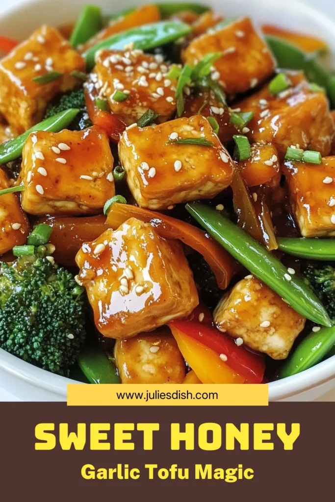 Discover the deliciousness of sweet honey garlic tofu with this easy tofu stir fry recipe! This honey garlic stir fry features firm tofu tossed with vibrant vegetables like bell peppers, broccoli, and snap peas, all coated in a fragrant sauce. Perfect for a quick weeknight dinner, this dish is a must-try among easy tofu recipes. Savor the flavors and add this to your meal prep! Save this recipe for later! #TofuStirFry #HoneyGarlicStirFry #EasyTofuRecipes #VegetableStirFry