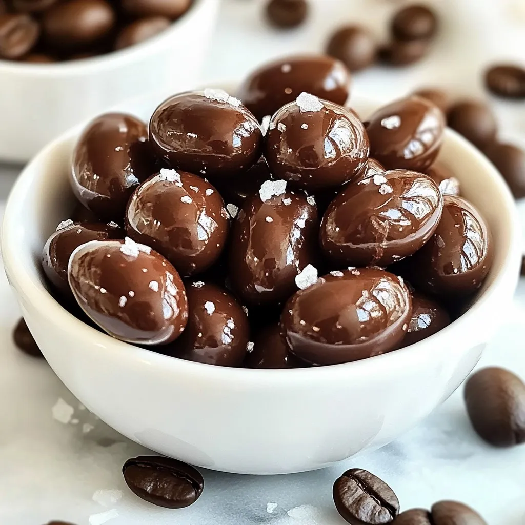 - 1 cup roasted espresso beans - 8 oz dark chocolate (70% cocoa or higher) - 1 tablespoon coconut oil (optional) - Sea salt (for topping) - 1 teaspoon vanilla extract (optional for flavor enhancement) - Microwave-safe bowl - Baking sheet - Parchment paper - Spatula or slotted spoon Using quality ingredients makes a big difference in taste. Roasted espresso beans bring that rich coffee flavor. Dark chocolate with 70% cocoa or more adds depth and sweetness. Coconut oil is optional, but it helps make the chocolate smoother. For the extra touch, sea salt balances the sweetness and enhances the flavor. Vanilla extract can add warmth if you choose to use it. It’s all about layers of taste. You also need the right tools to make this recipe easy. A microwave-safe bowl helps melt the chocolate without burning it. A baking sheet lined with parchment paper makes for easy cleanup. The spatula or slotted spoon is key for coating the beans evenly. This simple list of ingredients and tools sets the stage for a tasty treat. It’s fun to create these chocolate-covered espresso beans. You’ll enjoy the process and the rich, flavorful boost they provide. {{ingredient_image_1}} To start, take a microwave-safe bowl. Combine 8 oz of dark chocolate with 1 tablespoon of coconut oil if you want a smooth melt. Heat this mixture in the microwave. Set it for 30 seconds. After that, take it out and stir. Keep heating in 30-second bursts until it is fully melted and smooth. If you like, you can stir in 1 teaspoon of vanilla extract at this point for extra flavor. Next, add 1 cup of roasted espresso beans to the melted chocolate. Use a spatula to stir gently. Make sure every bean gets a nice, even coat of chocolate. This is where the magic happens! Now, grab a baking sheet and line it with parchment paper. Use a fork or a slotted spoon to lift the chocolate-coated beans from the bowl. Place them onto the lined baking sheet in a single layer. While the chocolate is still warm, sprinkle a pinch of sea salt over the beans. This will really boost the flavor! Let the chocolate-covered beans sit at room temperature until they harden. If you want to speed things up, pop the baking sheet in the refrigerator for about 20 minutes. Once the chocolate is set, any clusters can be broken apart easily. Enjoy your tasty treats! To coat your espresso beans well, make sure each bean gets a nice layer of chocolate. Use chocolate that is at room temperature or slightly warm. This helps the chocolate stick better to the beans. If the chocolate is too hot, it may melt the beans. If it’s too cool, it won’t coat well. You can try different flavored chocolates to make your treat unique. Dark chocolate is rich, but milk or white chocolate can add sweetness. Adding a pinch of sea salt balances the sweetness. You can adjust how much salt you use based on your taste. Some may like it salty, while others might prefer less. To keep your chocolate-covered beans fresh, store them in an airtight container. This keeps them from getting stale. Place the container in a cool, dark spot, like a pantry. Avoid moisture, as it can ruin the chocolate. If you want them to last longer, consider freezing them. Pro Tips Choose Quality Chocolate: The better the chocolate, the richer the flavor. Opt for high-quality dark chocolate with 70% cocoa or higher for a decadent treat. Experiment with Flavors: Don’t hesitate to add different flavorings like orange zest or a dash of cinnamon to the melted chocolate for a unique twist. Store Properly: Keep your chocolate-covered espresso beans in an airtight container at room temperature to maintain their crunch and flavor. Use a Double Boiler: If you're not comfortable using a microwave, melt the chocolate using a double boiler to ensure even melting without burning. {{image_2}} You can change the flavors of your chocolate-covered espresso beans. Try using white chocolate or milk chocolate instead of dark chocolate. Each type offers a different taste. You can also add spices like cinnamon or chili powder. These spices add warmth and depth. A pinch of chili powder gives a nice kick. It makes each bite exciting! Get creative with mix-ins and toppings. Crushed nuts add a nice crunch. You can use almonds, hazelnuts, or pecans. Dried fruits like cranberries or cherries give a sweet touch. You can even make a chocolate-covered espresso trail mix. Combine your beans with nuts, dried fruits, and maybe even some seeds. This mix is great for snacking on the go! Don't limit yourself to just espresso beans. You can use different types of coffee beans for unique flavors. Try using light roast beans for a fruity note or dark roast for a bolder taste. Each type of bean gives a new twist to your treat. Experiment with what you like best! To keep your chocolate-covered espresso beans fresh, store them in a cool, dry place. The ideal temperature is between 60°F and 70°F. Avoid areas with high humidity, as moisture can make the chocolate sticky. Keep them in an airtight container to prevent exposure to air and light. Homemade chocolate-covered espresso beans can last for about two weeks at room temperature. If stored properly, they can last up to a month in the fridge. Over time, the chocolate may lose some of its crispness, but the flavor remains strong. You can freeze chocolate-covered espresso beans to extend their life. To freeze them, place the beans in an airtight container or a freezer bag. Make sure to remove as much air as possible. To thaw, leave them at room temperature for about an hour. This method keeps them tasting great while preserving their texture. For the best flavor, choose roasted espresso beans. Look for beans that are fresh and have a rich aroma. I recommend using beans that are medium to dark roasted. These will give you a bold taste. You can try different origins like Colombian or Ethiopian for unique flavors. Always buy high-quality beans to ensure great results in your chocolate-covered espresso treat. Yes, you can use milk chocolate. However, the taste and texture will change. Milk chocolate is sweeter and creamier than dark chocolate. This can make your beans less bitter. If you love a sweet treat, milk chocolate is a good choice. Just remember, it may not have the same rich flavor as dark chocolate. You can also mix both types of chocolate for a fun twist! You can make chocolate-covered espresso beans without coconut oil. Simply melt the dark chocolate on its own. It may be a bit thicker without the coconut oil. To help, you can add a splash of milk or cream. This will keep the chocolate smooth. Stir well until the beans are fully coated. Enjoy your tasty treat! You learned how to make delicious chocolate-covered espresso beans using simple ingredients. We explored the right melting techniques, coating methods, and ways to add flavors. Remember to keep those beans fully covered and to store them properly. Try different chocolates and toppings for a fun twist. With these tips, you’ll enjoy customized treats at home. Enjoy sharing your creations or savoring them yourself!