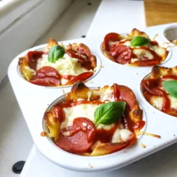 For these tasty keto pepperoni pizza cups, you will need: - 1 cup almond flour - 1 cup shredded mozzarella cheese - ½ cup cream cheese, softened - 1 large egg - ½ teaspoon baking powder - 1 teaspoon Italian seasoning - ½ teaspoon garlic powder - 1 cup pizza sauce (sugar-free) - 1 cup sliced pepperoni - ½ cup shredded mozzarella cheese (for topping) - Fresh basil leaves, for garnish (optional) Each serving of these pizza cups offers a great low-carb option. Here is the basic nutrition info per cup: - Calories: 150 - Protein: 8g - Fat: 12g - Carbohydrates: 3g - Fiber: 1g - Net Carbs: 2g This makes them a great snack or meal for anyone on a keto diet! If you need to adjust your recipe, here are some easy swaps: - Almond flour: You can use coconut flour, but reduce the amount to ⅓ cup. - Mozzarella cheese: Cheddar or provolone cheese can also work well. - Cream cheese: Neufchâtel cheese is a lower-fat option that's creamy. - Pizza sauce: Any low-carb tomato sauce can replace the pizza sauce. - Pepperoni: Turkey pepperoni or diced cooked sausage can be used instead. - Fresh basil: Oregano or parsley can substitute for fresh basil for garnish. These swaps keep the flavor and help you stick to your diet! {{ingredient_image_1}} First, set your oven to 375°F (190°C). This heat makes the crust nice and crispy. While the oven warms up, grab a muffin tin. Grease it well with cooking spray or olive oil. This step stops the pizza cups from sticking. You want each cup to pop out easily after baking. Now, let’s make the dough. Take a large microwave-safe bowl. Add 1 cup of shredded mozzarella cheese and ½ cup of softened cream cheese. Microwave this mix for about 30-45 seconds. The cheese should melt and become gooey. Stir it until smooth. Next, add the dry ingredients. Include 1 cup of almond flour, 1 large egg, ½ teaspoon of baking powder, 1 teaspoon of Italian seasoning, and ½ teaspoon of garlic powder. Mix everything together until a dough forms. It should feel soft and slightly sticky. Divide the dough into 12 equal portions. Press each portion into the bottom and sides of the greased muffin cups. This forms the crust for your pizza cups. Bake the crusts in the preheated oven for 8-10 minutes. Look for a slightly golden and firm texture. After baking, take the muffin tin out of the oven. Spoon about 1 tablespoon of sugar-free pizza sauce into each cup. Then, add a few slices of pepperoni on top. Finish with a sprinkle of ½ cup of shredded mozzarella cheese. Return the muffin tin to the oven. Bake for another 5-7 minutes. You want the cheese to bubble and turn golden brown. Once done, let the cups cool for a few minutes. Carefully remove them from the muffin tin. If you’d like, garnish with fresh basil leaves. Enjoy your delicious pizza cups warm! To melt cheese well, you need low heat. Use a microwave-safe bowl. 1. Combine mozzarella and cream cheese. 2. Heat in short bursts of 30 seconds. 3. Stir between heats to prevent burning. This method keeps your cheese smooth. It melts evenly and gives a great texture for your dough. A crisp crust makes these pizza cups shine. Follow these tips to get it right: 1. Preheat your oven to 375°F (190°C). 2. Grease your muffin tin well. This helps with easy removal. 3. Bake the crusts until golden. This usually takes 8-10 minutes. Don’t skip baking the crust first. It sets the base and avoids sogginess. Filling your pizza cups right is key. Overfilling can cause mess and sogginess. 1. Use about 1 tablespoon of pizza sauce in each cup. 2. Add just a few slices of pepperoni. 3. Sprinkle cheese lightly on top. Keep it simple. This way, the flavors blend well, and each bite stays balanced. Pro Tips Use Fresh Ingredients: Fresh pepperoni and high-quality mozzarella cheese can significantly enhance the flavor of your pizza cups. Watch the Baking Time: Keep an eye on the crust while baking to ensure it doesn't become too hard; you want it firm but not dry. Experiment with Toppings: Feel free to add other toppings like bell peppers, olives, or mushrooms for a personalized touch. Cool Before Serving: Allow the pizza cups to cool for a few minutes before removing them from the muffin tin to prevent them from falling apart. {{image_2}} You can make a great vegetarian version of these pizza cups. Instead of pepperoni, use your favorite veggies. Try bell peppers, mushrooms, or olives. Chopped spinach adds nice flavor too. You can still use the same crust. Just top each cup with pizza sauce and your veggie mix. Bake them the same way. This option keeps it low-carb and tasty. If you like heat, go for the spicy pepperoni. Choose spicy turkey or beef pepperoni for a kick. You could even add sliced jalapeños for extra spice. Just layer them on top of the sauce as usual. Bake until the cheese is bubbly. This version will please anyone who loves spicy food. Cheese can change the flavor of your pizza cups. While mozzarella is classic, you can try cheddar or provolone. Mixing cheeses can be fun too. Use half mozzarella and half cheddar for a richer taste. You can also add a sprinkle of Parmesan on top for extra flavor. Experiment with different cheese blends to find your favorite. To store leftover pizza cups, let them cool first. Place them in an airtight container. Keep them in the fridge for up to four days. If you want to keep them longer, freezing is a great option. To freeze your pizza cups, wait until they cool completely. Then, wrap each cup in plastic wrap. Place the wrapped cups in a freezer-safe bag. They will stay good for up to three months. When you are ready to eat them, just thaw in the fridge overnight. To reheat pizza cups, preheat your oven to 350°F (175°C). Place the cups on a baking sheet. Heat for about 10-15 minutes, or until warm. For a quick option, you can also use a microwave. Heat them for about 30-60 seconds. Enjoy your tasty pizza cups again! Yes, you can use different flours for the crust. Almond flour works well, but you might try coconut flour. If using coconut flour, use less. Coconut flour absorbs more moisture. Start with a quarter cup and adjust as needed. Each Keto Pepperoni Pizza Cup contains about 3 grams of carbs. This amount may vary based on the brand of ingredients you choose. Always check the labels for exact numbers. These cups fit well into a low-carb diet. Yes, you can make these pizza cups ahead of time. Prepare the crust and fill them with sauce and toppings. Store them in the fridge for up to three days. When ready to eat, just bake them until warm. This makes meal prep easy and fun! Keto Pepperoni Pizza Cups are easy to make and fun to enjoy. We covered the ingredients, step-by-step instructions, tips for the best results, and storage methods. You learned about variations to suit your taste. Whether you like spice or want a veggie option, these cups fit the bill. In the end, this dish combines flavor and health. Get creative with your toppings and enjoy these pizza cups anytime!