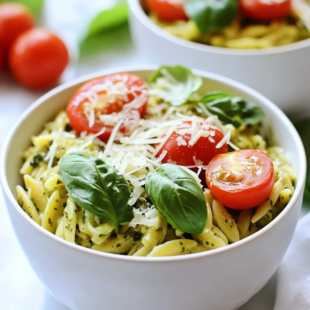 To make the creamy pesto orzo, gather these fresh and simple ingredients: - 1 cup orzo pasta - 2 cups vegetable broth - 1 cup heavy cream - 1/2 cup basil pesto (homemade or store-bought) - 1/2 cup grated Parmesan cheese - 1 cup cherry tomatoes, halved - 1 cup baby spinach - 2 cloves garlic, minced - 2 tablespoons olive oil - Salt and pepper to taste - Fresh basil leaves for garnish Each ingredient plays a key role in making this dish rich and vibrant. The orzo pasta adds a nice bite, while the vegetable broth brings depth. Heavy cream gives it a silky texture, and basil pesto packs in fresh flavor. Cherry tomatoes add sweetness, and baby spinach boosts nutrition. Garlic enhances aroma, and good olive oil ties it all together. Don't forget to season with salt and pepper for balance, and fresh basil leaves make a lovely garnish. {{ingredient_image_1}} 1. Start by boiling the vegetable broth in a medium pot. Bring it to a rolling boil. 2. Add 1 cup of orzo pasta to the boiling broth. 3. Cook the orzo for about 8-10 minutes. This gives you the perfect al dente texture. 4. Drain any extra broth once the orzo is cooked. 1. While the orzo cooks, heat 2 tablespoons of olive oil in a large skillet over medium heat. 2. Add 2 cloves of minced garlic to the skillet. Sauté it for about 1 minute until it smells good. 3. Next, toss in 1 cup of halved cherry tomatoes. Cook them for 3-4 minutes until they soften. 1. Add the cooked orzo to the skillet with the tomatoes and garlic. 2. Pour in 1 cup of heavy cream and mix it well. Let it simmer gently. 3. Stir in 1/2 cup of basil pesto and 1/2 cup of grated Parmesan cheese. Keep mixing until creamy. 4. Finally, fold in 1 cup of baby spinach. Cook for about 2 minutes until it wilts. 5. Season with salt and pepper to taste before serving. For a great creamy pesto orzo, I have some simple swaps for you. If you want less fat, use half-and-half instead of heavy cream. You can also try Greek yogurt for a tangy twist. If you can't find orzo, use small pasta like ditalini or macaroni. To get a creamy texture, stir the sauce gently. This keeps it smooth. Let it simmer for a few minutes after adding the cream and pesto. This helps all the flavors blend together nicely. When serving, use nice bowls to show off your dish. A deep bowl keeps the sauce from spilling. Add extra grated Parmesan on top for a pop of flavor. Fresh basil leaves make it look pretty and fresh. You can even drizzle with olive oil for a shiny finish. For sides, a light salad works well. A simple arugula salad with lemon dressing pairs nicely. You can also serve garlic bread for a comforting touch. Roasted veggies like zucchini or bell peppers add color and flavor to your meal. Pro Tips Use High-Quality Pesto: The flavor of your pesto will significantly impact the overall taste of the dish, so choose a high-quality store-bought option or make your own for the best results. Don't Overcook the Orzo: Keep an eye on the orzo as it cooks; al dente pasta will hold its shape better and provide a lovely texture in your creamy dish. Customize Your Veggies: Feel free to add other vegetables like zucchini, bell peppers, or asparagus for added color and nutrition to your orzo. Garnish for Presentation: A sprinkle of extra Parmesan and fresh basil not only enhances the flavor but also makes your dish visually appealing. {{image_2}} You can easily make this dish your own. Adding protein can change the meal. Try chicken, shrimp, or tofu. Each option gives a new taste and texture. Grilled chicken adds a nice smoky flavor. Shrimp brings a sweet touch. Tofu soaks up the sauce well. Switching up vegetables is another way to customize. Zucchini and bell peppers work great. Zucchini adds a mild crunch. Bell peppers bring a sweet, juicy bite. Feel free to mix and match your favorites. If you need gluten-free options, look for gluten-free orzo. Many brands offer this choice. It cooks just like regular orzo. You won’t lose any of the creamy goodness. For vegetarian or vegan diets, swap out the heavy cream. Use coconut milk or cashew cream instead. This keeps it rich and tasty without dairy. Also, make sure your pesto is vegan by avoiding cheese. Don’t feel stuck with just basil pesto. You can try different pesto flavors. Sun-dried tomato pesto offers a tangy twist. Spinach or arugula pesto adds freshness. If you want a change, try a creamy Alfredo sauce. Each sauce gives the dish a unique taste. To keep your creamy pesto orzo fresh, store it in an airtight container. This helps prevent it from drying out. Make sure to let it cool to room temperature before sealing. In the fridge, it lasts for about three to four days. If you want it to last even longer, consider freezing it. When you’re ready to enjoy your leftovers, reheat them gently. The best way is to use a skillet over low heat. Add a splash of vegetable broth or cream to keep it creamy. Stir often to avoid burning. You can also microwave it, but be sure to cover it. This keeps moisture in and helps it warm evenly. Yes, you can freeze creamy pesto orzo! Just make sure it’s in a freezer-safe container. It can last up to three months in the freezer. When you’re ready to eat, take it out and let it thaw overnight in the fridge. For reheating, use the same skillet method or microwave until hot. Add a little cream or broth to bring back the creamy texture. Orzo is a type of pasta that looks like rice. It is small and oval-shaped. Orzo cooks quickly and has a soft texture. You can use it in soups, salads, or main dishes. It absorbs flavors well, making it a great base for creamy sauces like pesto. Yes, you can prepare creamy pesto orzo in advance. Cook the orzo and mix in the sauce, but don't add the spinach right away. Store it in an airtight container in the fridge. When you're ready to serve, just heat it in a pan. Add the spinach at the end so it stays fresh and bright. Creamy pesto orzo pairs well with many sides. Here are some great options: - Grilled chicken or shrimp for protein - A fresh green salad with lemon vinaigrette - Roasted vegetables like zucchini or bell peppers - Garlic bread to soak up the sauce You can use store-bought pesto for this recipe. It's a time-saver and still tastes good. However, homemade pesto has a fresher flavor. If you want to make your own, blend fresh basil, garlic, nuts, olive oil, and cheese. Both options work but vary in taste. In this post, I shared a simple way to make creamy pesto orzo. We covered the right ingredients, step-by-step instructions, and tips for perfecting the dish. You can customize flavors with proteins and veggies, and I provided storage and reheating tips to keep it fresh. Remember, you can make this dish your own. Enjoy experimenting with different pesto flavors and pairings. It's a fun recipe that flavors your meals. With a bit of practice, you'll master this dish and wow your friends and family!